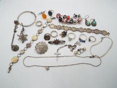 A small collection of silver and other jewellery to include a Pandora style bracelet,