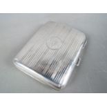 A George V hallmarked silver cigarette case, Birmingham assay 1919,