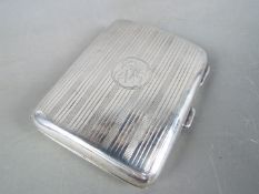 A George V hallmarked silver cigarette case, Birmingham assay 1919,