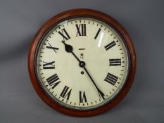 An oak cased English (dial diameter 30 cm (12 inches) dial wall clock,