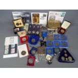 A collection of coins, commemorative crowns and similar, small quantity of stamps,