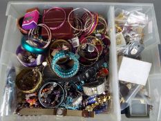 A mixed lot of costume jewellery to include necklaces, brooches earrings and similar,