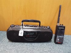 A Sony portable music centre and a Grecom radio receiver [2]