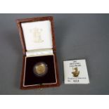 A 1993 issue Britannia 1/10oz gold Proof Britannia coin (3.