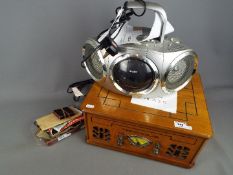 A Teknique antique style record player and a Bush stereo system,