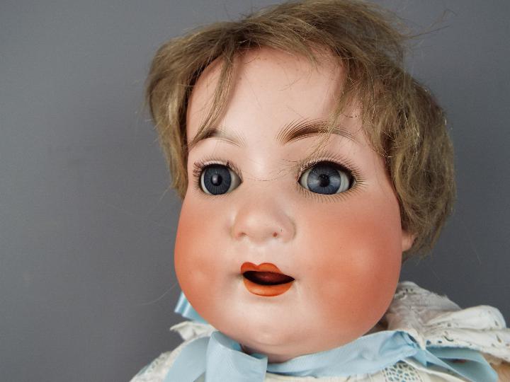 Heubach Koppelsdorf - a girl doll with ceramic face, painted eyebrows and lashes, - Image 3 of 6