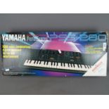 A Yamaha PSS-280 Portasound, electronic keyboard, contained in original box.