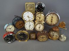 A mixed lot of sixteen vintage alarm clocks various designs and sizes to include Westclox, Timecal,