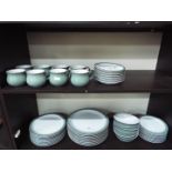 A quantity of Denby dinner and tea wares to include dinner plates, side plates, bowls, cups,