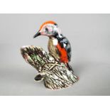 An Anita Harris woodpecker,