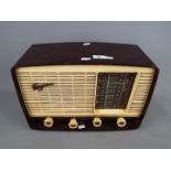 A vintage Ferguson bakelite cased radio, model 621U.