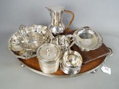 A collection of good quality plated ware to include coffee pot, sucrier and creamer set, tazza,