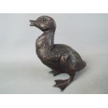 A bronze duck,