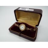 A 9ct gold cased lady's wristwatch (bezel and glass detached),