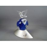 Swarovski - A Swarovski Crystal Millennium Edition paperweight in the form of a dove of peace