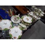 A large collection of Paragon China dinner and tea ware in the 'Rockingham' pattern,