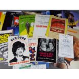 A collection of theatre programmes and ticket stubs.