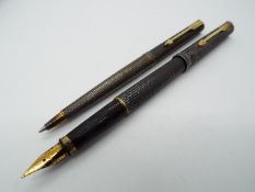 A Parker pen set comprising fountain pen and ballpoint, both stamped 925.