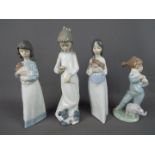 Nao - Four Nao figurines depicting young girls, largest approximately 26 cm (h).