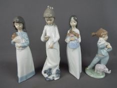 Nao - Four Nao figurines depicting young girls, largest approximately 26 cm (h).