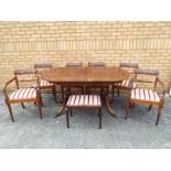 A good quality extending dining table measuring approximately 76 cm x 154 cm (extending to 190 cm)