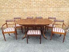 A good quality extending dining table measuring approximately 76 cm x 154 cm (extending to 190 cm)