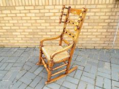 A good quality rocking chair with rush seat.