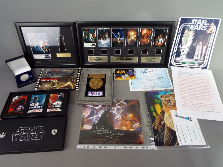 Star Wars - A collection of Star Wars related items including limited edition film cell montages,