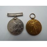 A World War One (WWI) Victory Medal named to 39030 PTE. J. WOODS. S. LAN. R.