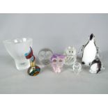 A small lot of glassware to include Mats Jonasson paperweights,