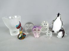 A small lot of glassware to include Mats Jonasson paperweights,