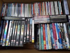 A box of CD's and DVD's.