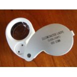 A Jeweller's Loupe, 30 x magnification with LED illumination, cased,