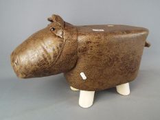 A Hippo footstool, approx height 33 cm,