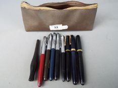 A collection of vintage pens to include Waterman's 515 (14ct nib), Parker Slimfold (14K nib),