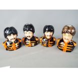 A set of limited edition Beatles character jugs from the Bairstow Manor Collectables collection