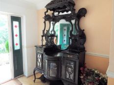 A good quality dark wood Credenza, bow fronted with mirrors above, as illustrated,