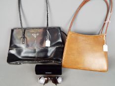 Two lady's handbags, one marked 'Gucci' (leather),