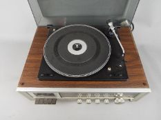 A vintage Lloytron stereo cassette recorder with turntable, model R820,