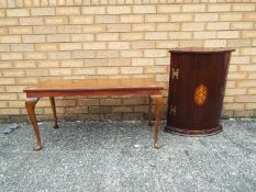 A coffee table, 44 cm x 92 cm x 43 cm, and a corner unit with inlaid decoration,