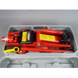 A Rolson 2 Tonne Hydraulic Trolley Jack contained in carry case.