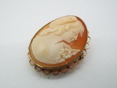 A 9ct gold mounted shell cameo brooch, 4 cm x 3 cm and 9.3 grams all in.