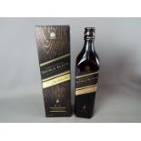 A bottle of Johnnie Walker Double Black 70 cl 43% ABV