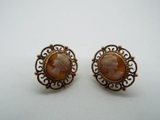 A pair of 9ct yellow gold shell cameo earrings with screw fasteners, approximately 6.4 grams all in.