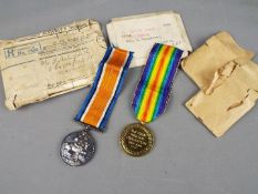 A World War One (WWI) campaign medal pair, British War and Victory, named to 96761 PTE. T.