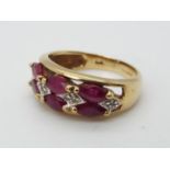 A 9ct gold, garnet and diamond ring, size H, approximately 2.84 grams all in.