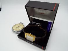 A gentleman's gold plated Accurist wristwatch on brown leather strap and contained in original box