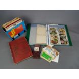 A mixed lot to include stamp album, loose stamps, cigarette cards,