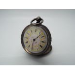 A lady’s silver cased pocket watch, case having engraved decoration,