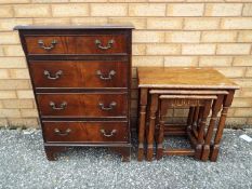 A small chest of four drawers measuring approximately 75 x 51 x 34 cm and a nest of three tables.